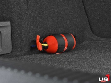 Универсальный автомобильный держатель огнетушителя UG1 с креплением на липучке к обивке