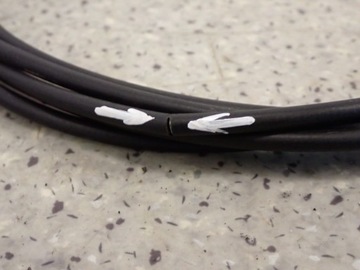 NISSAN ПРИМЕЧАНИЕ E12 12- ТРОС ОТКРЫТИЯ ТОПЛИВНОЙ ЛЕНТКИ