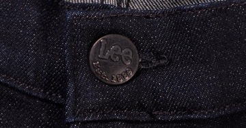 LEE spodnie SKINNY navy TAPERED jeans LUKE _ W34 L30