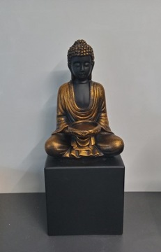 Świecznik budda.20cm.Kolor czarno-złoty