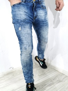 Spodnie męskie jeans przetarcia niebieskie jasne wycierane slim RM 34