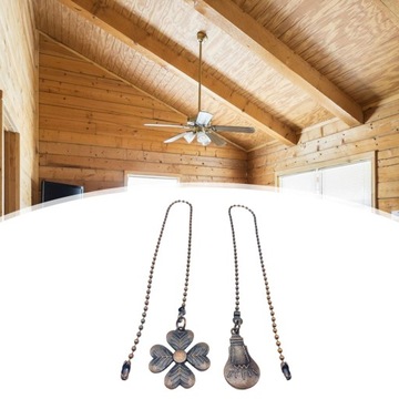 Удлинительная цепочка веером с декором в виде красно-коричневых шариков.