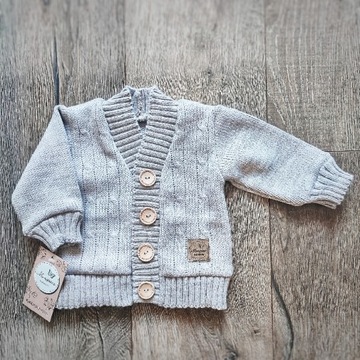 Бежевый свитер с декоративной тесьмой