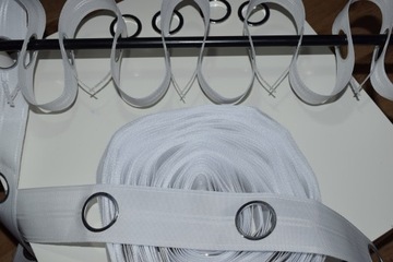 ЛЕНТА ЖЕСТКАЯ С ЛЮСНЯМИ для штор шириной 8см.