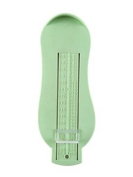 Измеритель размера детской обуви.