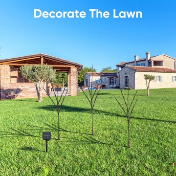 Предварительно освещенные ветки березы подсвечены декоративными светильниками