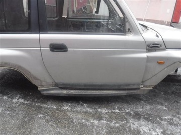 DVEŘE PRAVÝ PŘEDNÍ SSANG YONG KORANDO 2.9 TDI