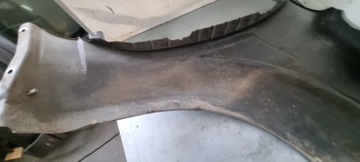 BLATNÍK LEVÝ PŘEDNÍ NISSAN NAVARA D40