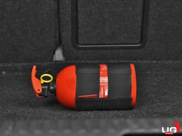 Универсальный автомобильный держатель огнетушителя UG1 с креплением на липучке к обивке