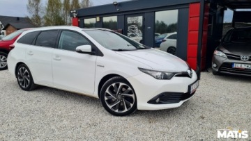 Toyota Auris II Touring Sports Facelifting 1.8 Hybrid 136KM 2016 Toyota Auris 1.8Hybryda Panorama Navi kamera climatronic 100 bezwypadek, zdjęcie 27