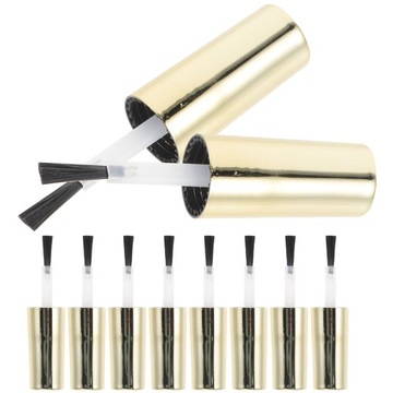 Кисточка для геля для ногтей. Крышки от бутылочек с лаком.