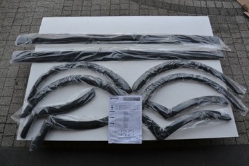 Suzuki Swift V 10-17 listwy poszerzenie błotników progi 990E0-68L10 NOWE