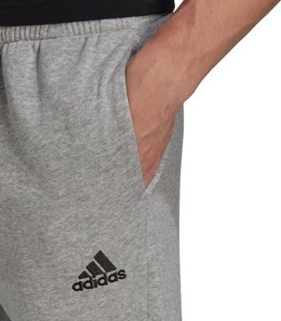 SPODNIE MĘSKIE ADIDAS ESSENTIALS FLEECE TAPERED SZARE HL2230 r M