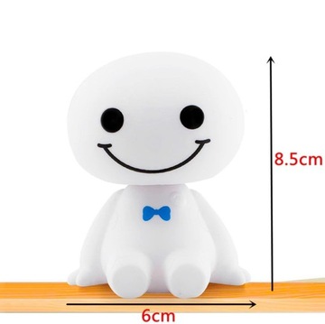 МАСКОТ, ДВИЖУЩИЙ ГОЛОВУ НА ИГРУШКЕ U КОКПИТА