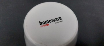 Небольшая фарфоровая сахарница.