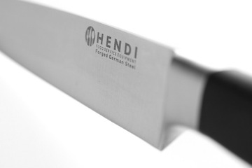 Профессиональный поварской нож, выкованный из нержавеющей стали.