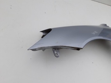 BLATNÍK LEVÝ MITSUBISHI LANCER VII 03-07R STŘÍBRNY A50
