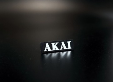 Логотип AKAI 35 x 11 мм самоклеящийся.