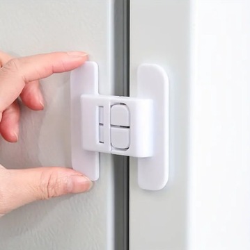 BLOKADA LODÓWKI NA DRZWI ZAMEK ZATRZASK ZABEZPIECZENIE MEBLI SZAFEK SZUFLAD