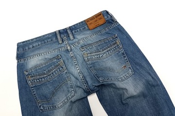 TOMMY HILFIGER STOKES SLIM MARKOWE JEANSY Pas 84 cm r. W30 L34