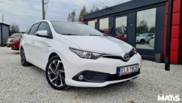 Toyota Auris II Touring Sports Facelifting 1.8 Hybrid 136KM 2016 Toyota Auris 1.8Hybryda Panorama Navi kamera climatronic 100 bezwypadek, zdjęcie 14