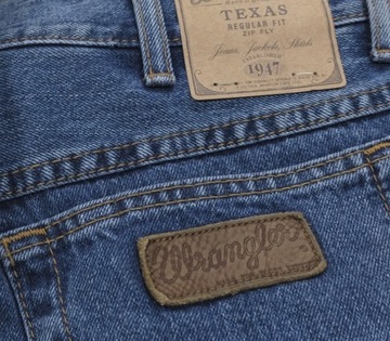 WRANGLER TEXAS SPODNIE jeansy stonewash W32 L36