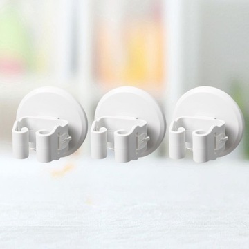 БЕЗТОЧЕЧНЫЙ ЗАЖИМ ДЛЯ ДЕРЖАТЕЛЯ ШВАБРЫ С ПРИСОСКОЙ