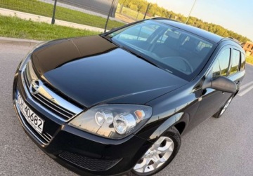 Opel Astra J Sports Tourer 1.6 Twinport ECOTEC 115KM 2010 Opel Astra LIFT 1.6i 115ps PDC GrzaneFotele Klima Doinwestowana Bezwypadko, zdjęcie 3