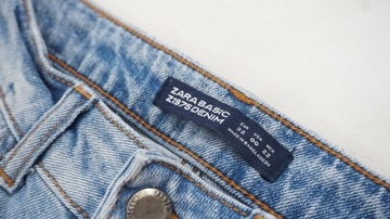 ZARA spodnie jeansy z dziurami haft r 32 k2