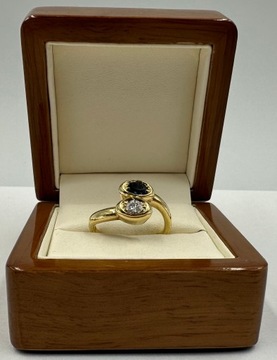 Złoty pierścionek 8,44g p750