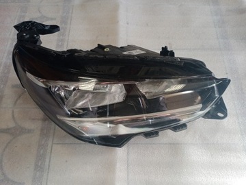 REFLEKTOR PRAWY OPEL CORSA F 9829465380