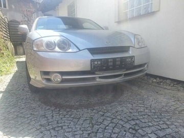 TLUMIČ LEVÝ HYUNDAI COUPE 2002R 2.0