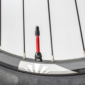 Ободная лента для бескамерных шин и вентиль для