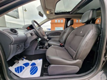 Renault Twingo II Hatchback 3d 1.2 16v 75KM 2011 Renault Twingo 1.2 75Ps Panorama Pol skory Alu Czarny 1.2 Benzyna 75KM, zdjęcie 9