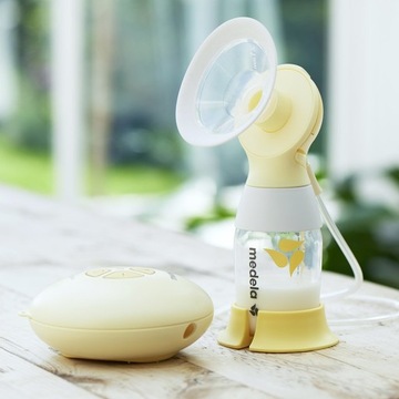 Электрический молокоотсос Medela, 300 мл, с двойным аккумулятором