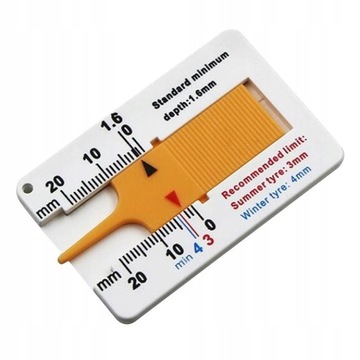 Линейка для измерения глубины протектора шин.