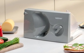 Слайсер ZELMER ZFS0916S мощностью 150 Вт для мясного ассорти и хлеба