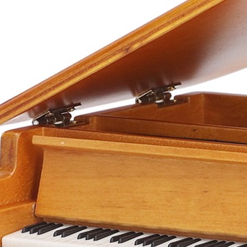 Музыкальная шкатулка в виде деревянного фортепиано.