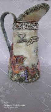 Декоративный металлический кувшин