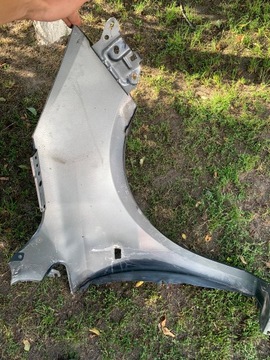 BLATNÍK LEVÝ PŘEDNÍ OPEL CORSA E 14R.