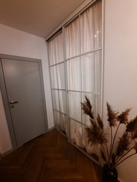 Двустворчатая раздвижная стеклянная стена-чердак