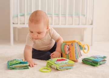 JollyBaby 4в1 Набор книжек, прорезывателей, ручка