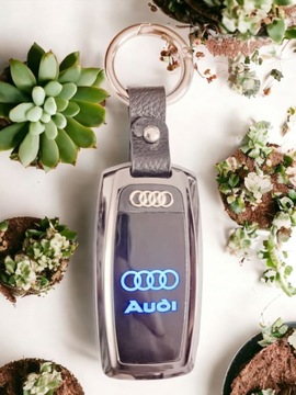 AUDI GLOW ЗАЖИГАЛКА ЭЛЕГАНТНЫЙ БРЕЛОК ДЛЯ БРЕЛКА СО СВЕТОДИОДНОЙ СВЕТОДИОДНОЙ ЛОГОТИПОМ, ЧЕХОЛ С БАНТОМ