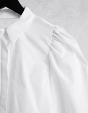 Biała koszula z obszernymi rękawami 42