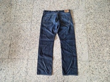 Tommy Hilfiger spodnie jeansy 34/32 ciemny granat PAS 94 cm