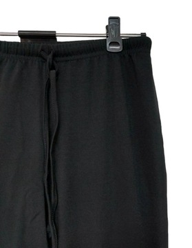 Czarne spodnie legginsy flara XL 42