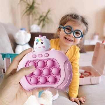 Gra zręcznościowa antystresowa pop it popit konsola push jednorożec