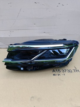 VW TOUAREG REFLEKTOR LEWY 761941081