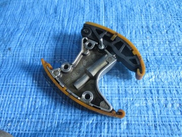 NAPINACZ ŚLIZG ŁAŃCUCHA AUDI VW 3.0 TDI 057109218