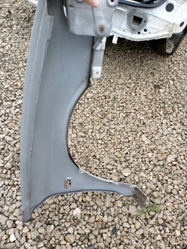 BLATNÍK LEVÝ PŘEDNÍ MITSUBISHI LANCER VI 97-03